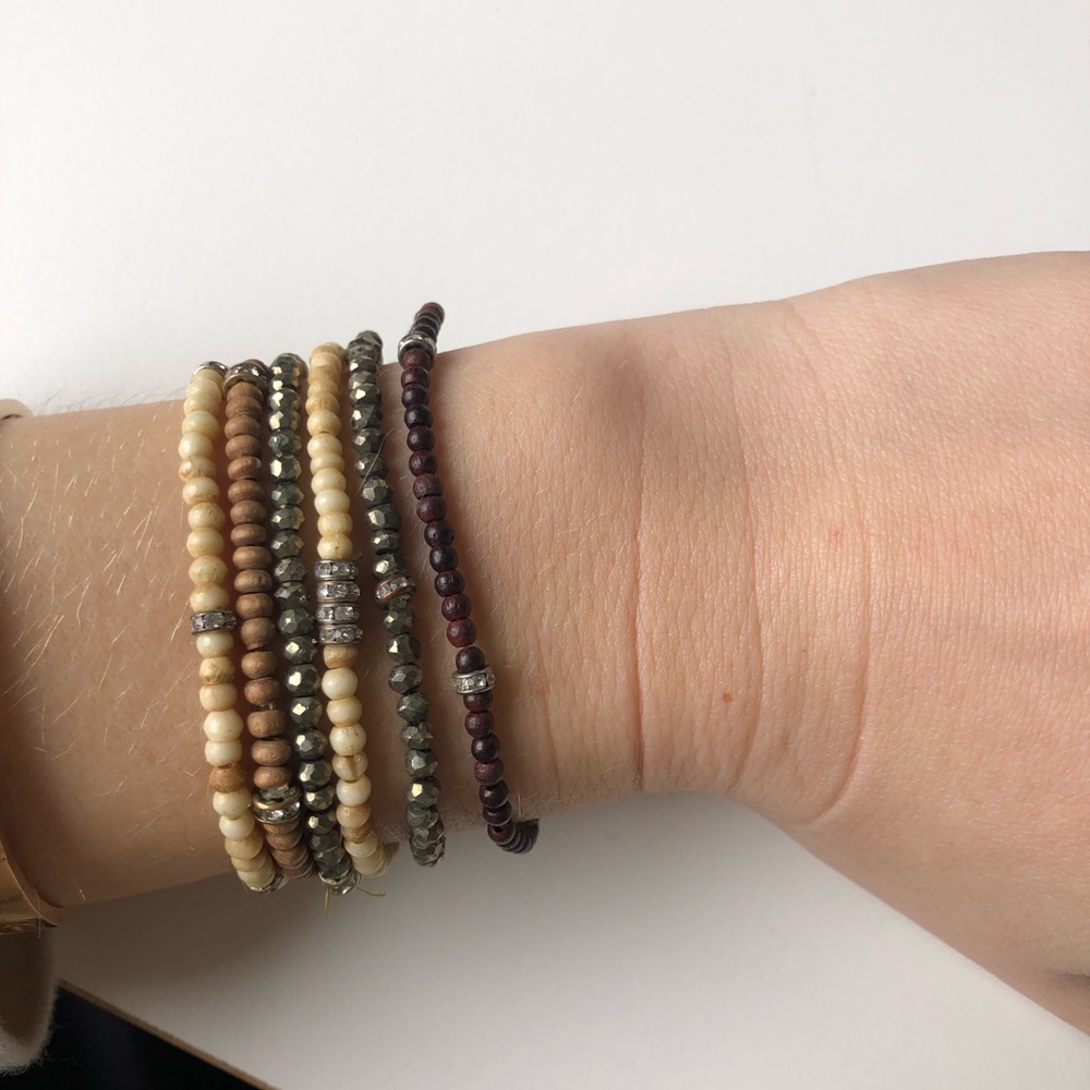 set of bracelets with black diamond charms